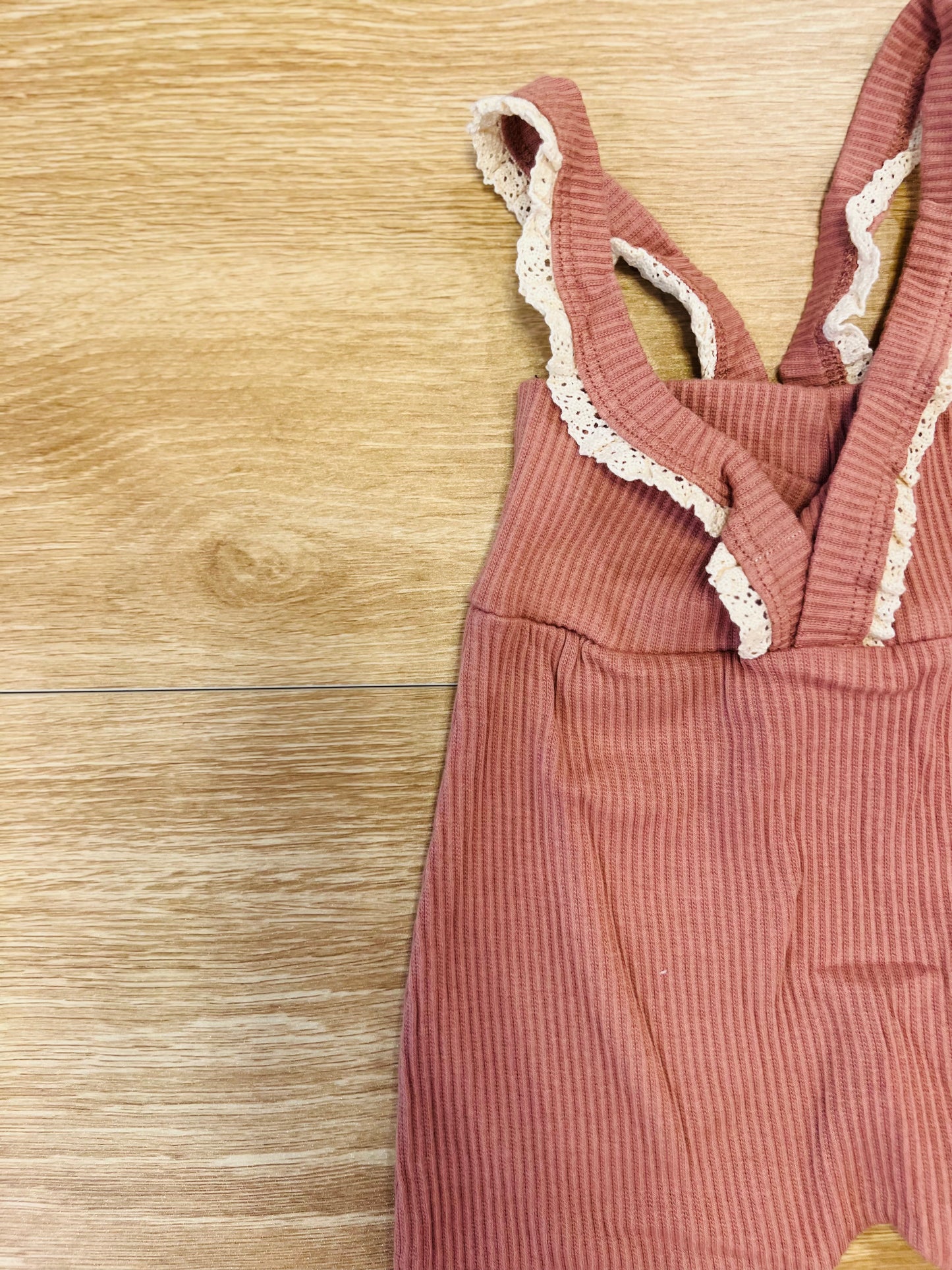 Pink ruffled suspenders