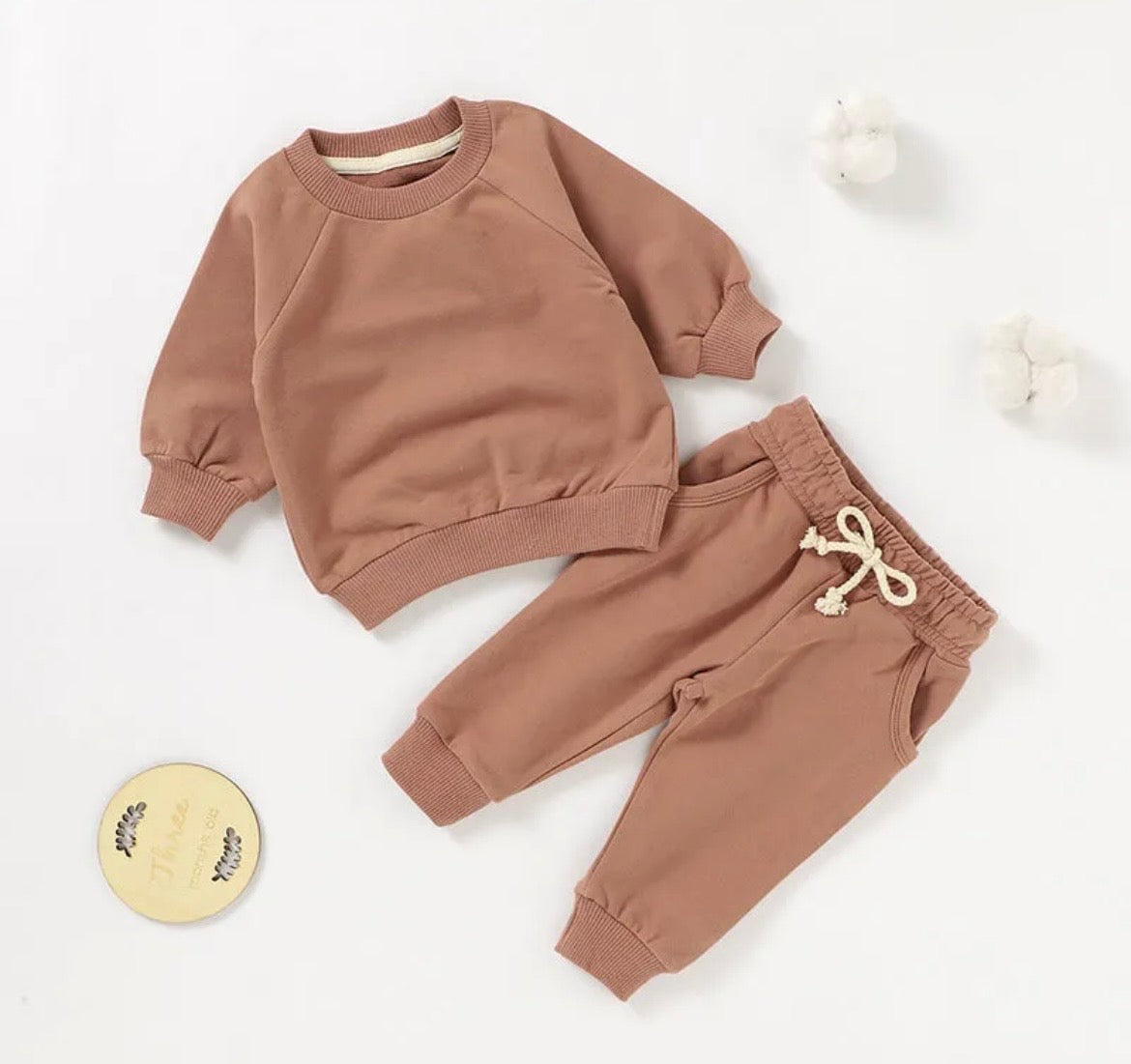 purple/tan sweatsuit