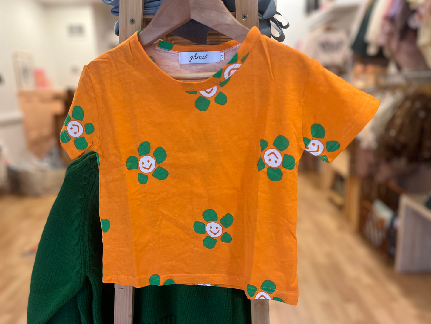 orange smiley tee