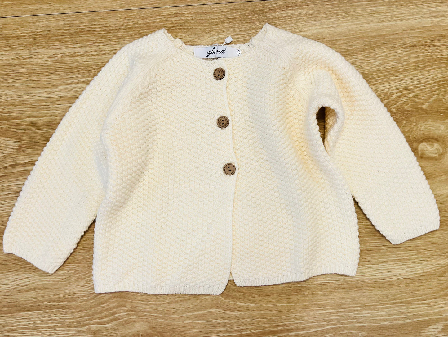 cream cardigan top
