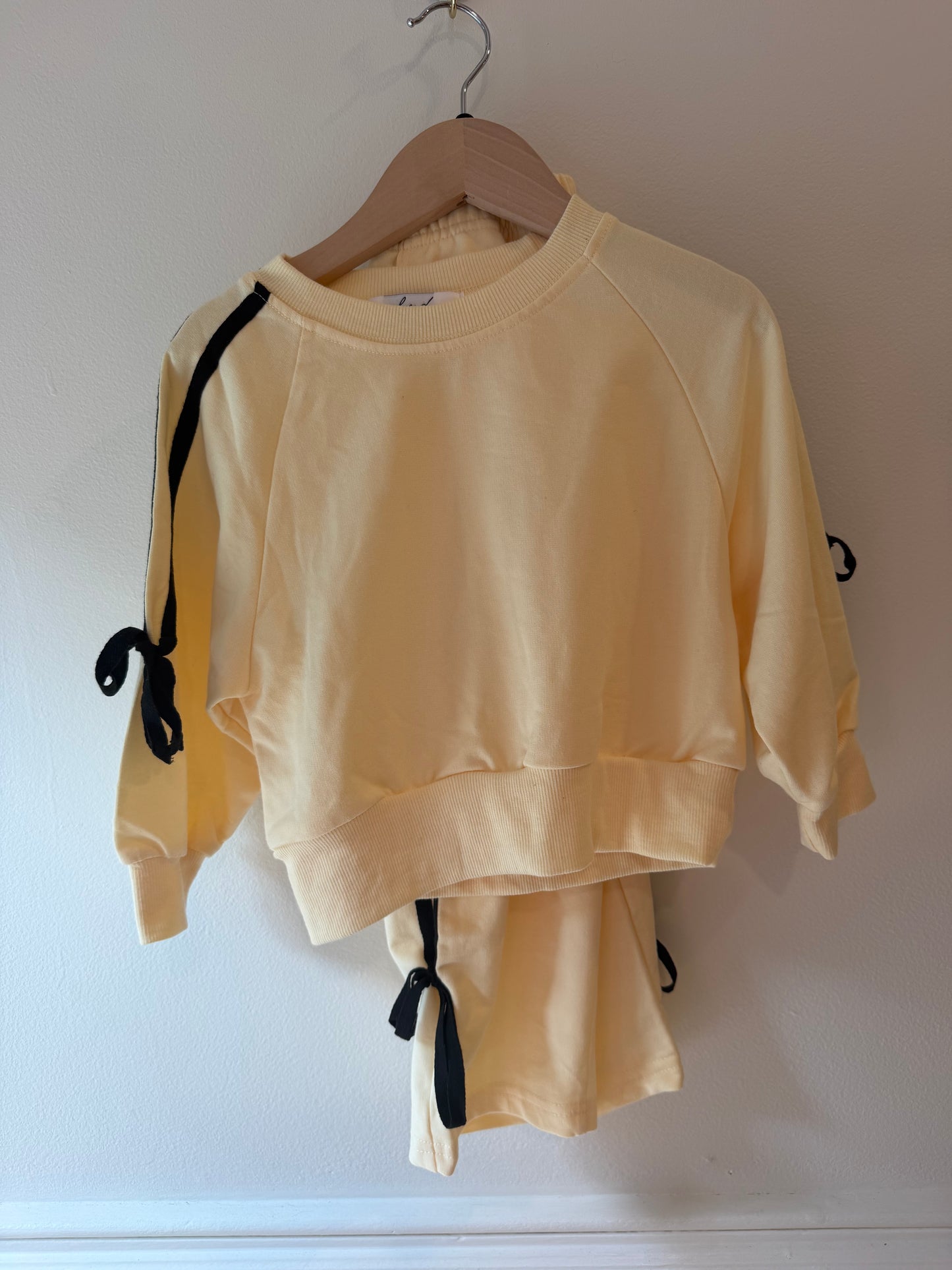 cream set with black ties