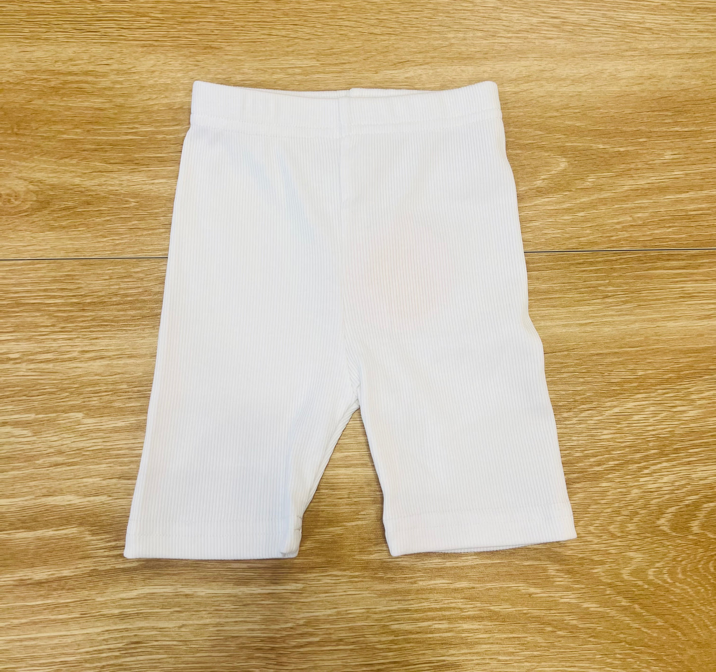 White spandex shorts